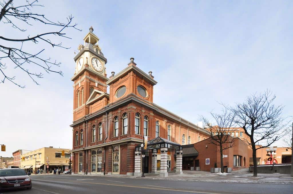 The front entrance of Market Hall beneath the clock tower, viewed from the south side of Charlotte Street.