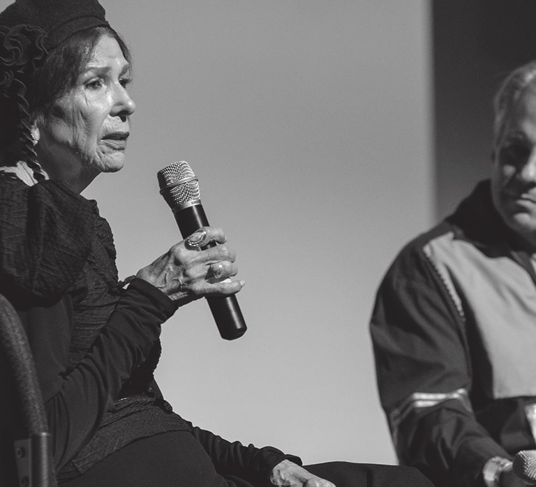 Alanis Obomsawin & Drew Hayden Taylor speaking on-stage at ReFrame 2020