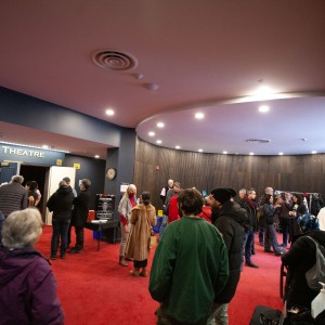 Crowd arriving and mingling in the Showplace Lobby