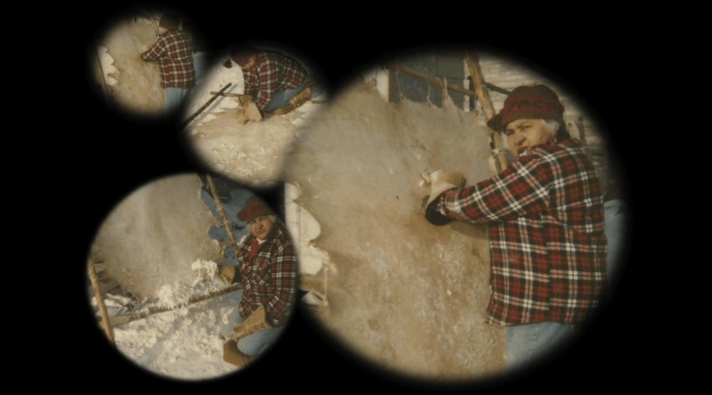 Viewed through multiple circular vignettes, the image captures an individual engaged in the process of hide tanning. The person is wearing a red plaid jacket and a warm cap, indicating a cold environment with snow on the ground. They are using tools to scrape and work on the hide, which is stretched out on a frame. Each circular frame overlaps to create a collage effect, showcasing different stages or angles of the hide tanning process.